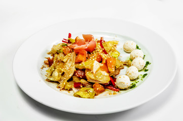 vegetable salad on a plate with cheese balls