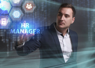 Business, Technology, Internet and network concept. Young businessman working on a virtual screen of the future and sees the inscription: HR manager