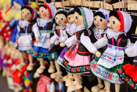 Traditional Czech dolls. Tourist souvenirs in the center of Prague.