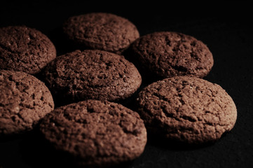 oatmeal cookies on a black table