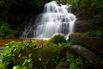 Obraz na płótnie Canvas Mun daeng Waterfall, the beautiful waterfall in deep forest at Phu Hin Rong Kla National Park ,Phitsanulok, Thailand