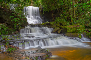 Fototapeta premium Mun daeng Waterfall, the beautiful waterfall in deep forest at Phu Hin Rong Kla National Park ,Phitsanulok, Thailand