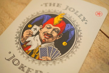 Playing cards and joly joker.