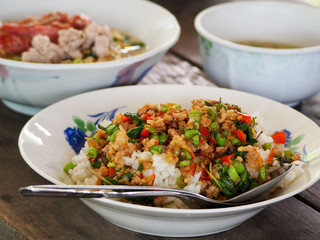 Rice topped with stir-fried pork and basil