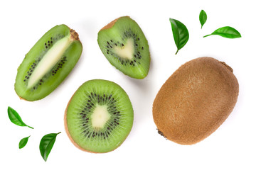 Fototapeta na wymiar Kiwi fruit with slices decorated with green leaves isolated on white background, close-up. Top view. Flat lay pattern