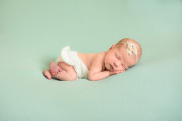 Stock photo of beautiful newborn baby sleeping in cute props © Nestyda