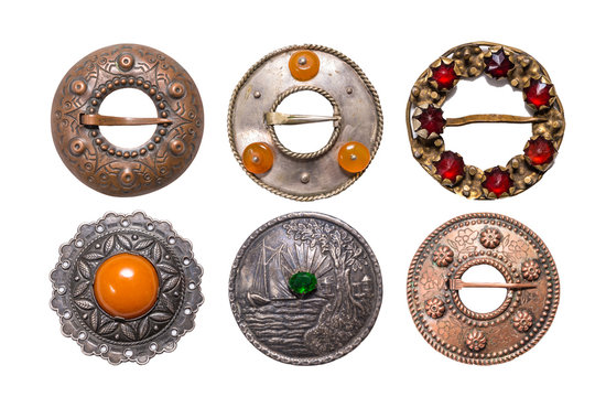 Set of antique metal Latvian national style brooches, Izolate