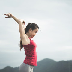 Asia woman doing yoga fitness exercise