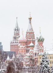 Fototapeta premium St. Basil Cathedral seen through the snow. Red Square, Moscow, Russia