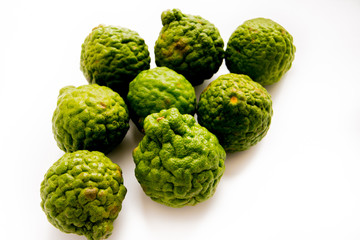 Bergamot on the white background. Citrus bergamia, the bergamot orange is a fragrant citrus with a yellow or green color similar to a lime.