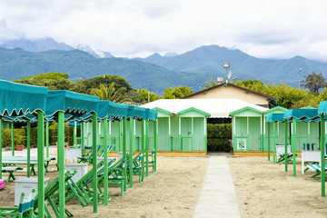 Daylight view to woman walking on beach pathway