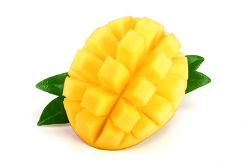 Mango fruit half with leaves isolated on white background close-up