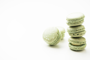 Tasty sweet macarons. Macaroons on white table.