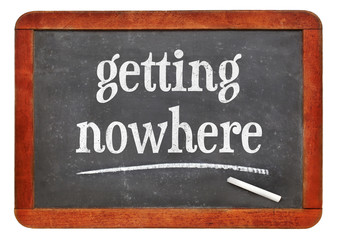Fototapeta premium getting nowhere text on balckboard
