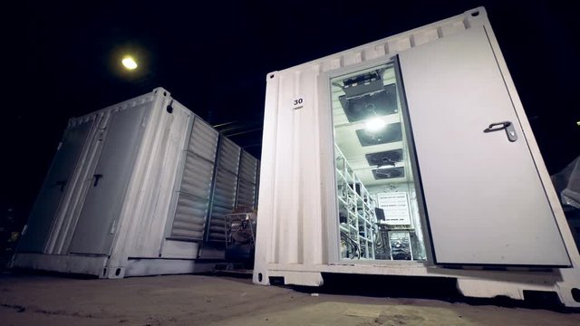 Cryptocurrency mining Data Center in metal container. 4K.