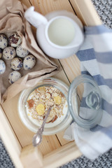 Obraz na płótnie Canvas Yogurt with muesli in a jar