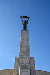 Fototapeta premium Liberty statue near the citadel on Gellert Hill