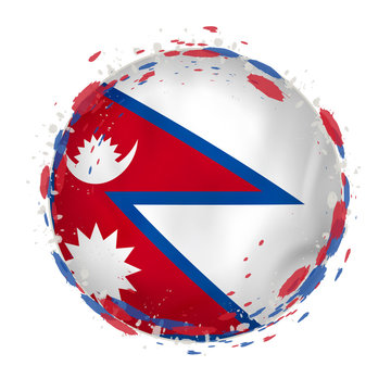 Round grunge flag of Nepal with splashes in flag color.