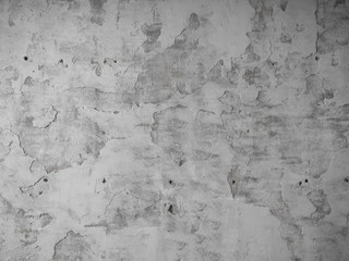 Light grey stone wall background texture.