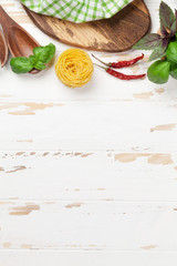 Cooking table with utensils and ingredients