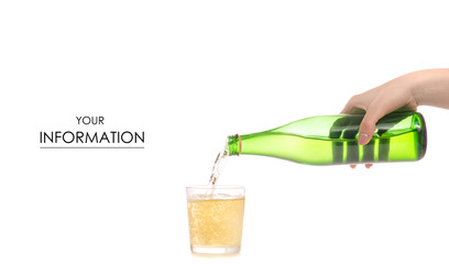 Glass bottle of soda carbonated lemonade water in a hand and glass pattern