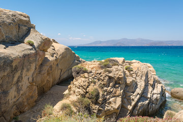 Fototapeta na wymiar Rocky coast in Agia Anna beach. Naxos island. Greece