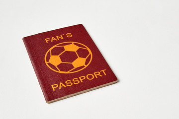 One abstract fan passport on white table