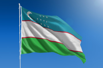 Uzbekistan flag in front of a clear blue sky