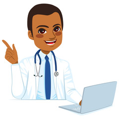 Fototapeta premium Young African American doctor consulting laptop and pointing hand smiling
