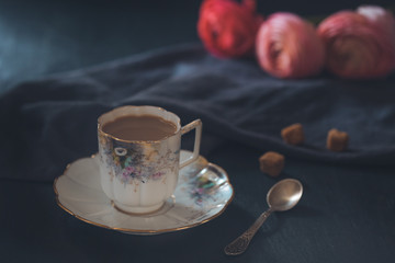 Obraz na płótnie Canvas Vintage cup of coffee on the table