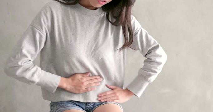 Woman suffer from Stomach pain