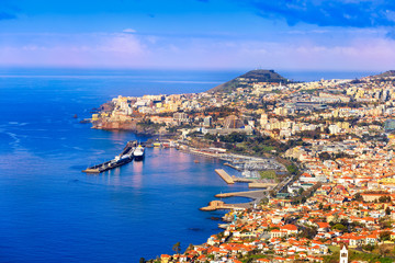 Naklejka na ściany i meble Panoramic view on Funchal city in daytime, Madeira island, Portugal