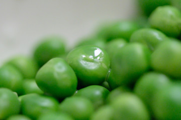 Boiled green peas close up