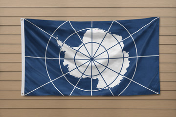 Antarctica Treaty Flag hanging on a wall