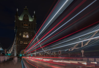 Light trails on Tower bridge at night, London, England.