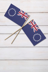 Cook Islands Two flags on a painted wood background