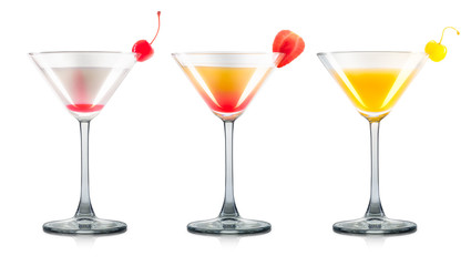 Set of mimosa cocktails in martini glass with cherry and strawberry isolated on white background with clipping path