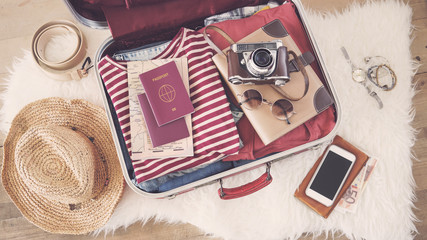Travel suitcase preparing concept 