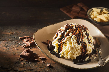 Spaghetti ice cream dessert with chocolate topping