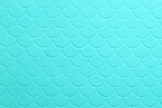 Paper embossing fish scales seamless texture. tiffany color background