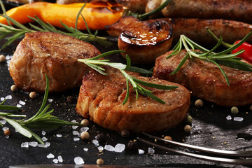 Assorted delicious grilled meat with vegetable on a barbecue