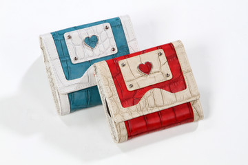 red and blue leather wallets with hearts