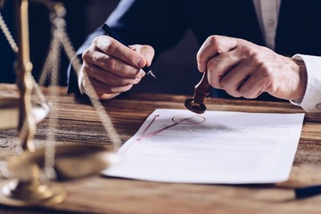 Male lawyer or notary working at his office