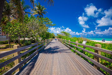 Walkway to famous South Beach, Miami Beach, Florida