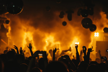 dj night club party rave with crowd in music festive - obrazy, fototapety, plakaty