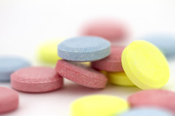 Obraz na płótnie Canvas Multicolored Pills. Pharmacy theme. Isolated on white background