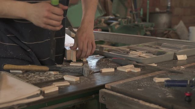 Working with chisel and hammer