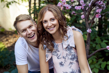 Fototapeta premium Attractive positive couple toothy smiling at camera
