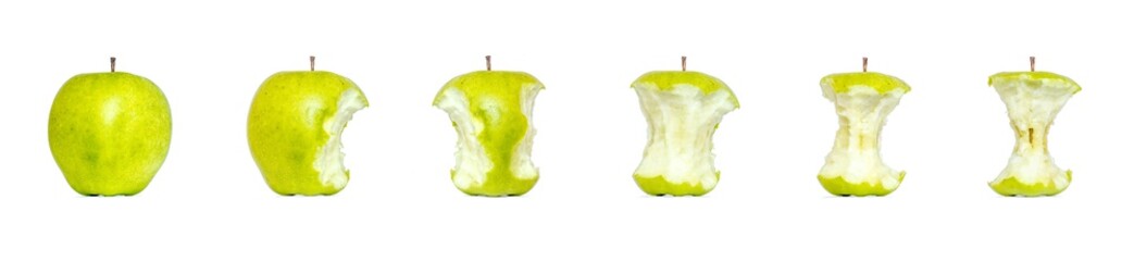 Green apple, a bitten off from different sides, a stub of a green apple isolated on a white background. Stages of eating an apple.