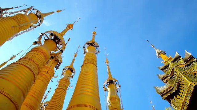 Rotating golden stupas with  hti decorative umbrellas, located in Inn Thein Buddha image Shrine, Indein (Inn Thein) village, Inle Lake, Myanmar.